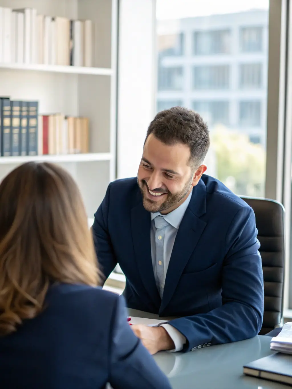 A professional headshot of a lawyer in a well-lit office, symbolizing the editorial spotlight service. The lawyer is smiling confidently, and the background is blurred to focus on the subject. The image is intended to convey trust and expertise.